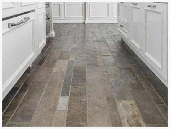 dining room with floor covered with slate board